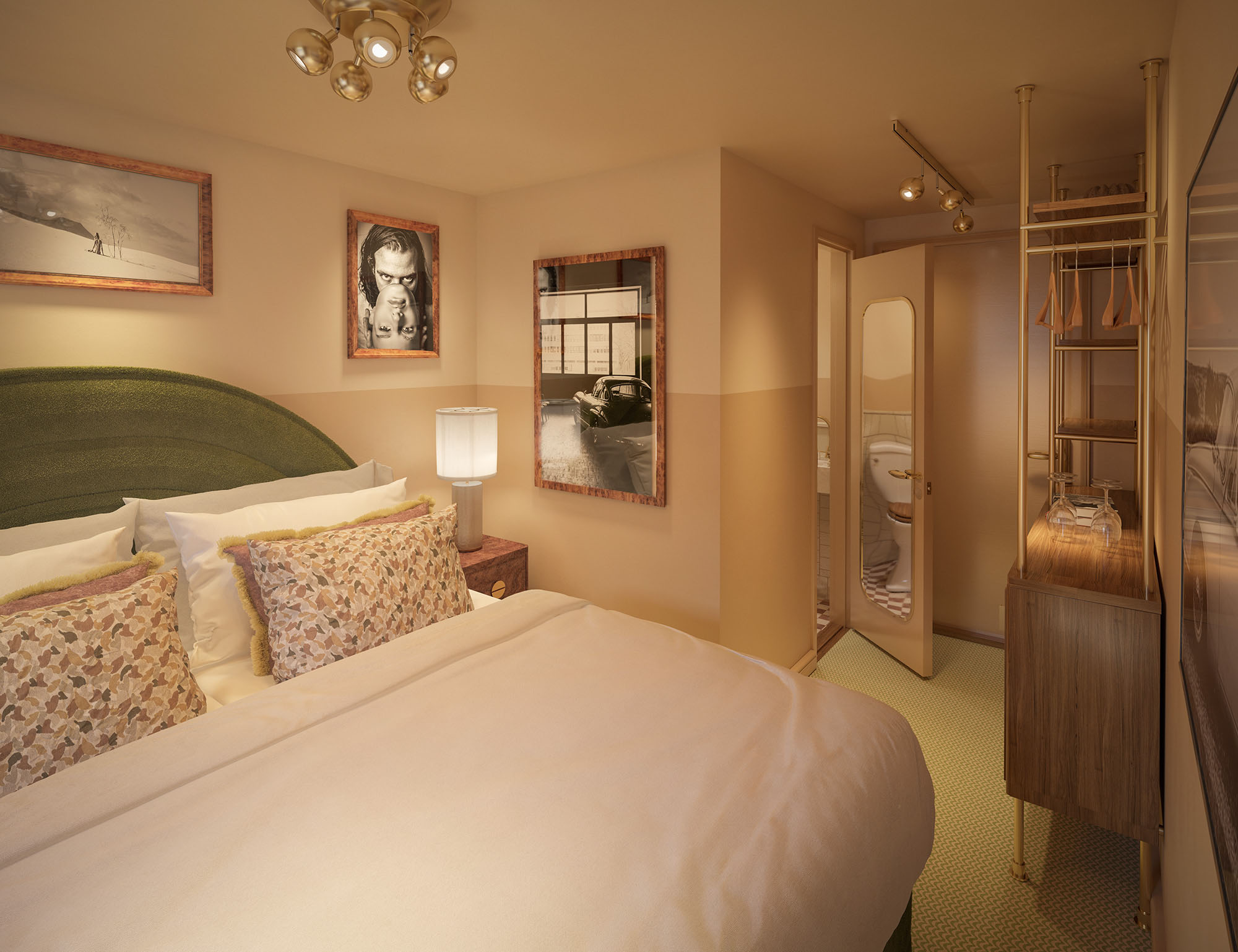 Hotel room with double bed, green headboard, framed photographs and open wardrobe