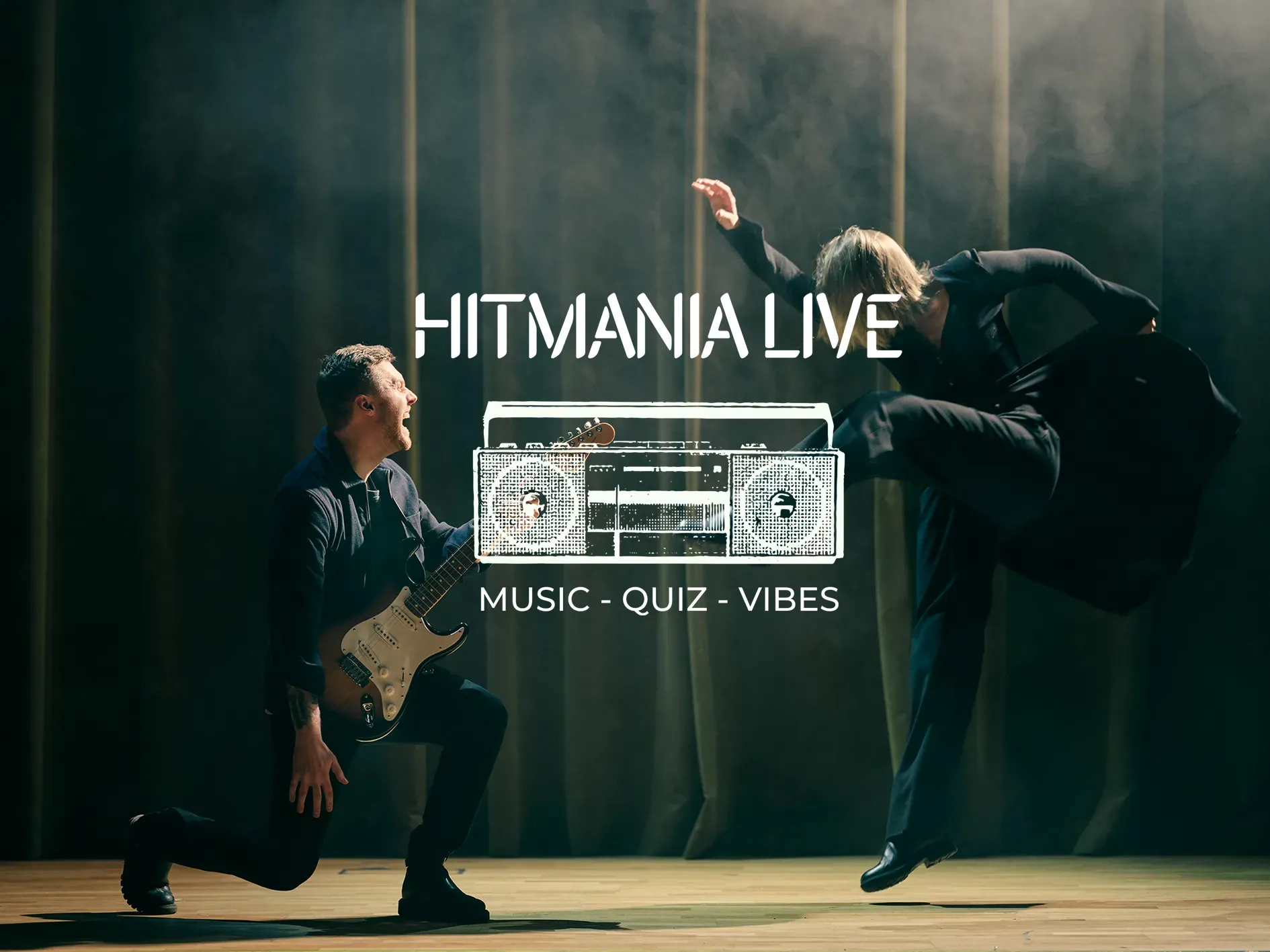 Hitmania Live, Music - Quiz - Vibes: gitarrist och dansare på en scen